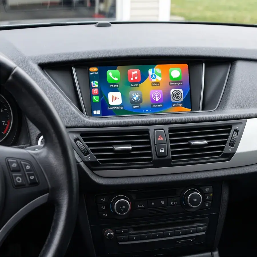 Same BMW CIC factory screen showing CarPlay after plug-and-play decoder install