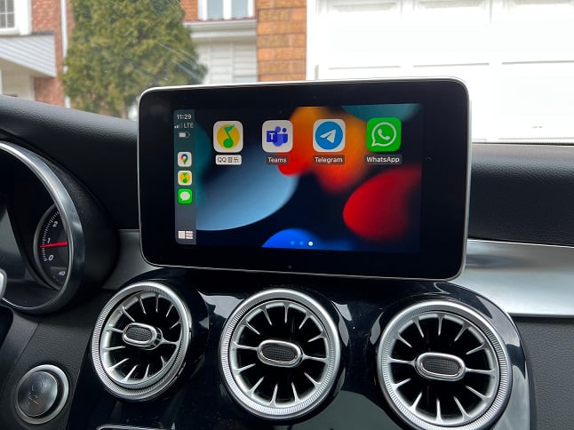 Mercedes-Benz C-Class wireless CarPlay real installation photo — factory screen