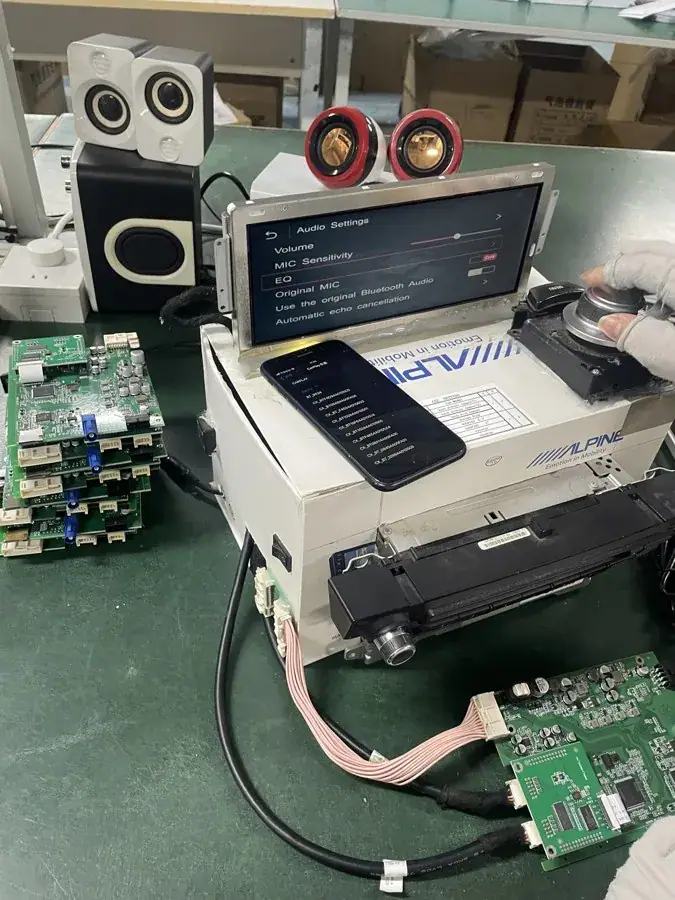 CarPlay decoder module function test station against a real factory head unit