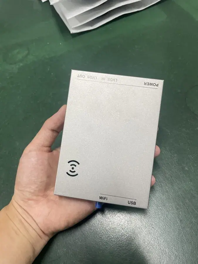CarPlay decoder module unit for a VW Golf 7 MIB retrofit showing LVDS, power and WiFi antenna ports